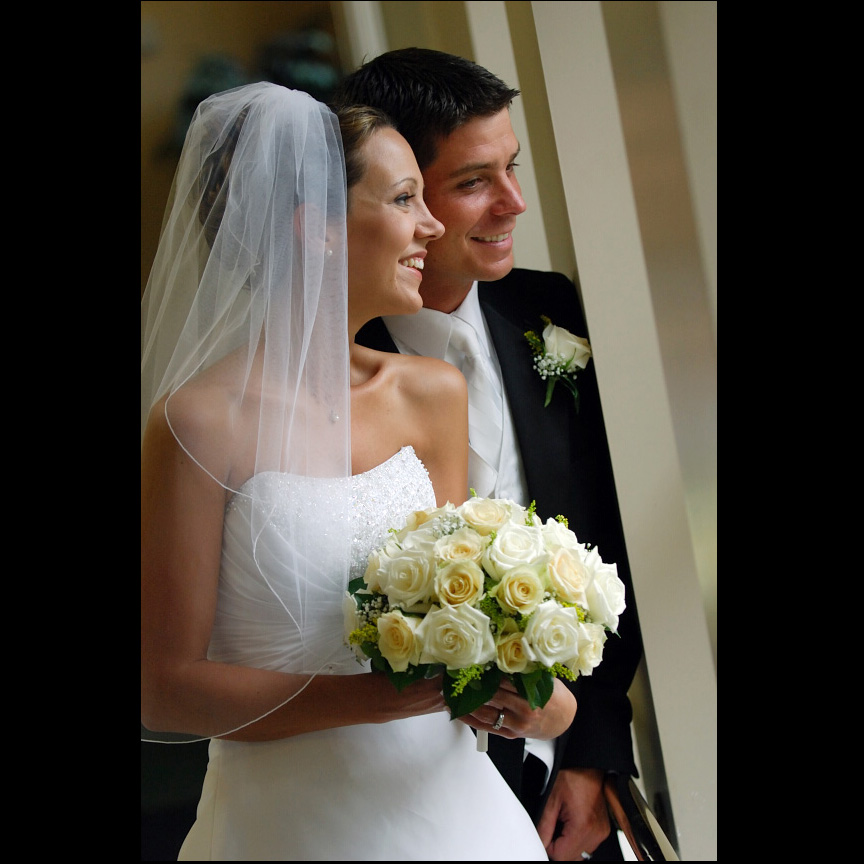 bride and groom share a happy moment